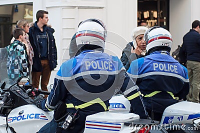 Biker of the national police making the traffic, during a demonstration people protesting in the street for save the planet Editorial Stock Photo