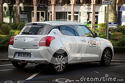 Rear view of city sharing car parked in the street Editorial Stock Photo