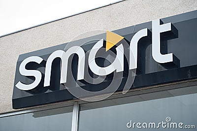 Smart logo sign in showroom front - Smart is the mini concept car brand of electric Editorial Stock Photo