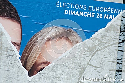 Torn posters of political party leaders ones of the candidates running in the May 2019 european elections Editorial Stock Photo