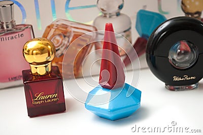 Various perfume bottles from different brand on white background Editorial Stock Photo