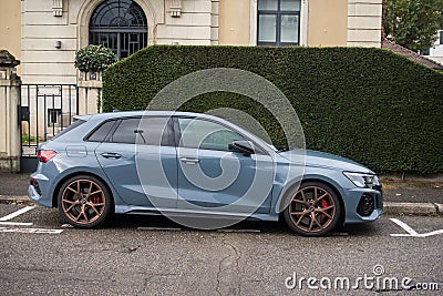 Profile view of blue Audi S1 parked in the street Editorial Stock Photo