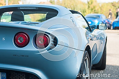 Closeup of Blue lotus Elise parked in the street Editorial Stock Photo