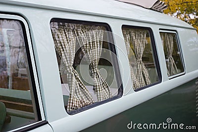 Volkswagen van windows on blue van of parked in the street Editorial Stock Photo