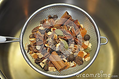 Mulling spices in colander Stock Photo