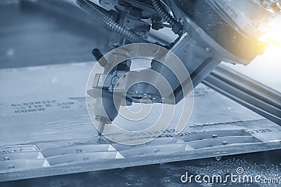 The multi-axis waterjet cutting machine with NC code data background Stock Photo