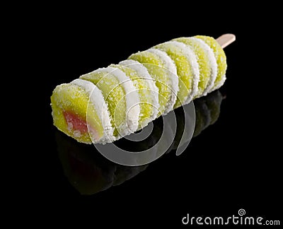 Multi color popsicle on a black background Stock Photo