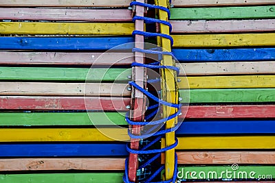 Multi-colored boards wood background abstract bright rope blue y Stock Photo