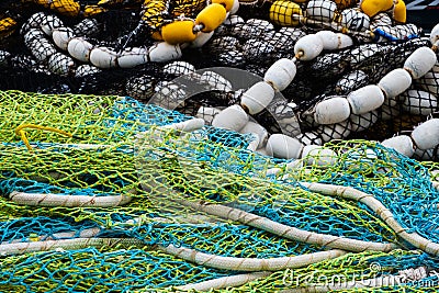 Multi-colored fishing nets in a pile Stock Photo