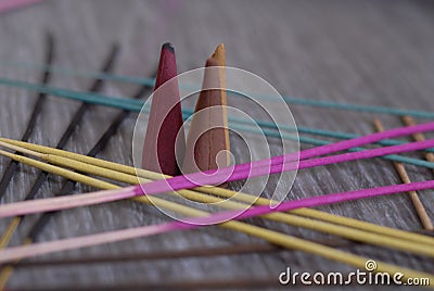 Multi colored incense sticks and cones Stock Photo