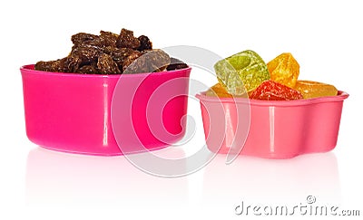 Multi colored kitchen molds with raisins and candy. Box closed in the shape of heart and star. Stock Photo