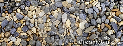 multi colored river pebbles for use as a background Stock Photo