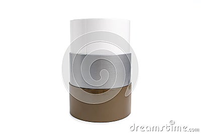 Multi-colored skeins of adhesive tape lie on top of each other on a white background Stock Photo