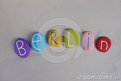 Berlin, capital city of Germany with colored stones over white sand Stock Photo