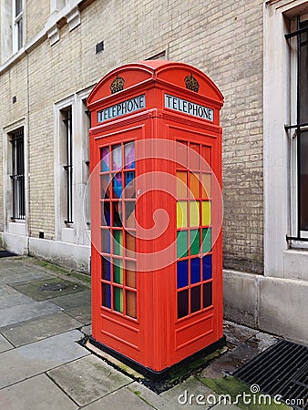 Multi coloured telephone box in london Editorial Stock Photo