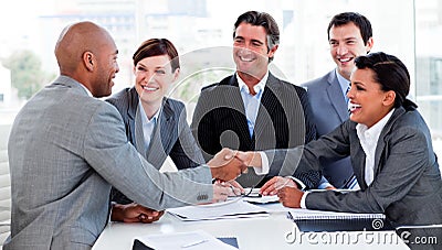 Multi-ethnic business people greeting each other Stock Photo