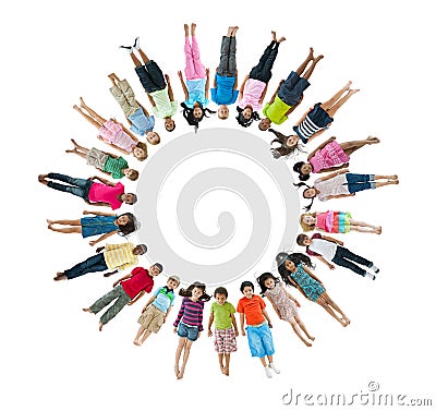 Multi-Ethnic Children Lying Down Forming Circle Stock Photo