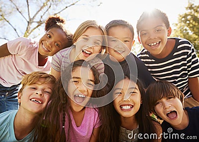 Multi-ethnic group of schoolchildren on school trip, smiling Stock Photo