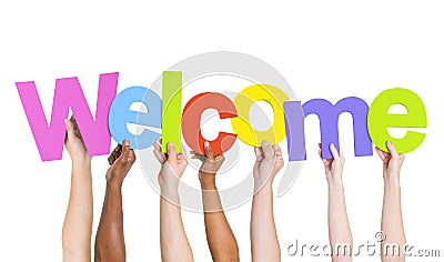 Multi-Ethnic Hands Holding The Word Welcome Stock Photo