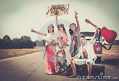 Multi-ethnic hippie friends on a road trip Stock Photo