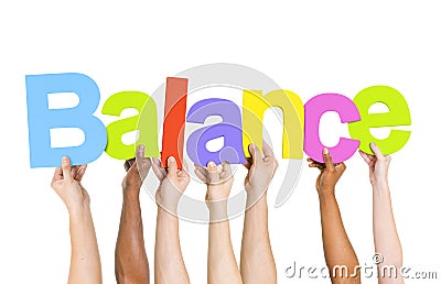 Multi Ethnic People Holding The Word Balance Stock Photo