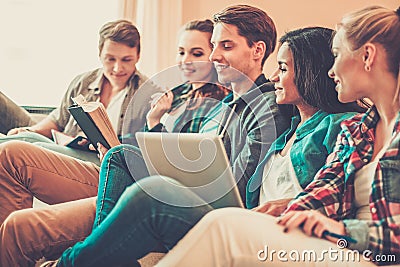 Multi ethnic young students preparing for exams Stock Photo