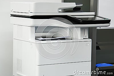 Multi-function printer machine ready for printing, copy, scanning business documents Stock Photo