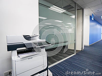 Multi-function printer machine ready for printing, copy, scanning business documents in office Stock Photo