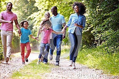 Multi Generation African American Family On Country Walk Stock Photo