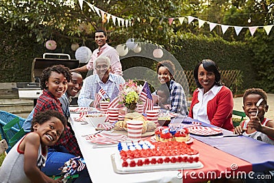 Multi generation black family having a 4th July garden party Stock Photo