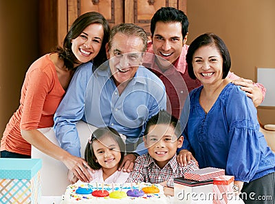 Multi Generation Family Celebrating Birthday Stock Photo