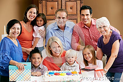 Multi Generation Family Celebrating Birthday Stock Photo