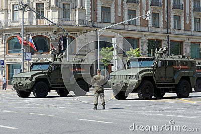 Multi-purpose armored vehicle `Typhoon-K` with a remote control combat module on Tverskaya street in Moscow during the dress rehea Editorial Stock Photo