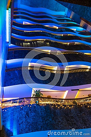 Multi-storey hotel floors terraces upward view Dubai Stock Photo