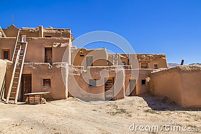 Multi-story adobe buildings from Taos Pueblo in New Mexico where Indigenous people are still living after over a thousand years Stock Photo