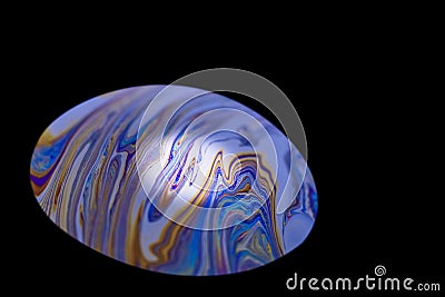 Multicolor abstract cold alien planet with an atmosphere in universe. Closeup soap bubble Stock Photo