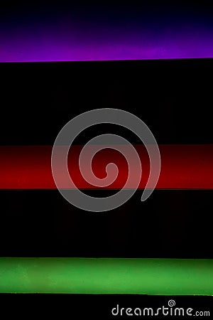 Multicolor neon color lights on black background Stock Photo