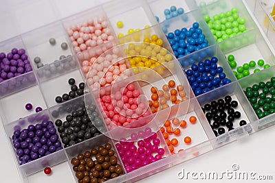 Multicolored beads for the children's educational aqua mosaic game Stock Photo