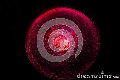 Multicolored bright lights from the optical fiber are blurred in motion. Modern abstract background for holiday. Stock Photo