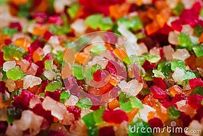Multicolored candied fruit on full frame close-up. Tutti-Frutti, served in a bowl, selective focus. Stock Photo