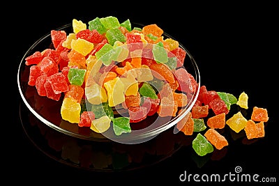 Multicolored candied fruits in a plate Stock Photo