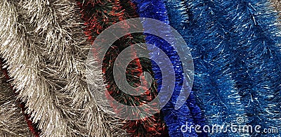 Multicolored christmas serpentine garlands for christmas tree background Stock Photo