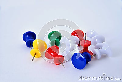 Pushpins on a white background macro Stock Photo