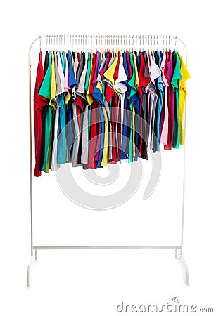 Multicolored clothes on hangers, isolate Stock Photo