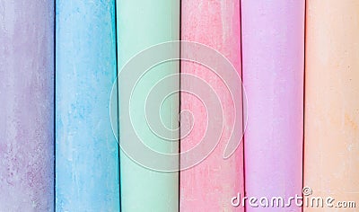 Multicolored crayons, pastel. stripes, lines, gentle. Green, yellow, pink, purple, blue. Painted Pastels white blackboard Stock Photo