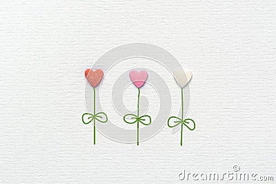 Multicolored Flowers in Heart Shape Made of Sugar Candy Sprinkles Hand Drawn Steams Leaves on White Watercolor Paper Stock Photo