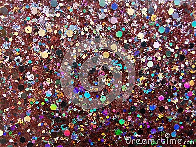 Multicolored glitter. Close-up on a glitter surface. Editorial Stock Photo
