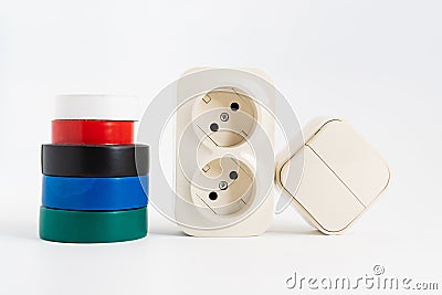 multicolored insulating tape,double socket,two-key light switch.white background Stock Photo