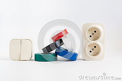 multicolored insulating tape,double socket,two-key light switch.white background Stock Photo