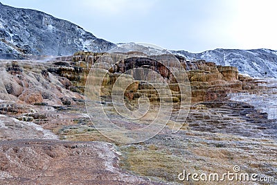 Multicolored limestone deposits in Mammoth Hot Springs in Yellowstone park Stock Photo